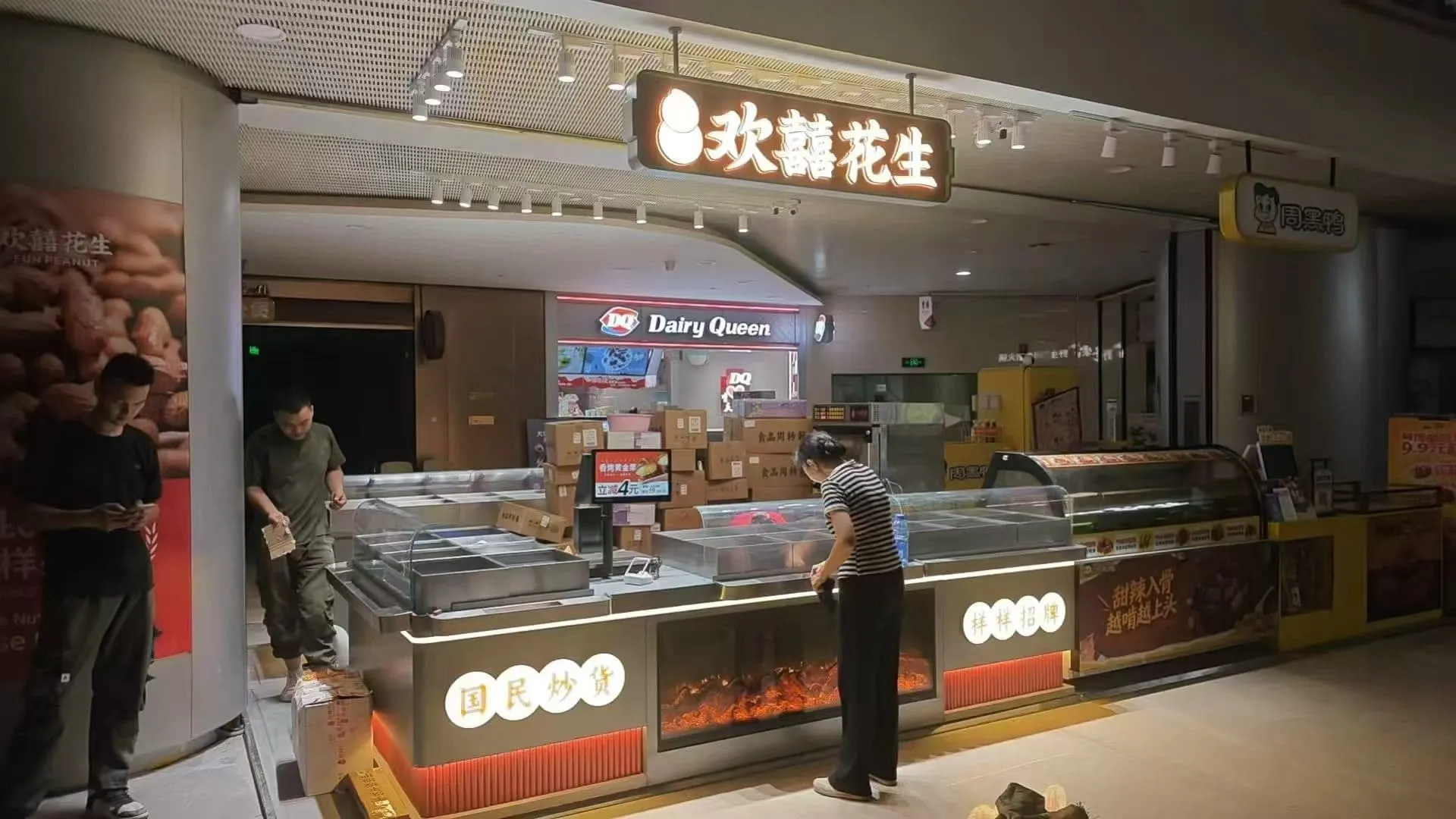 Corner-format snack counter with red canopy